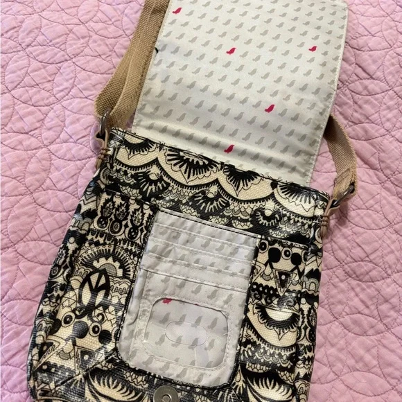 Sakroots Black and Cream Crossbody Bag with Vintage-Inspired Design - Picture 2 of 10